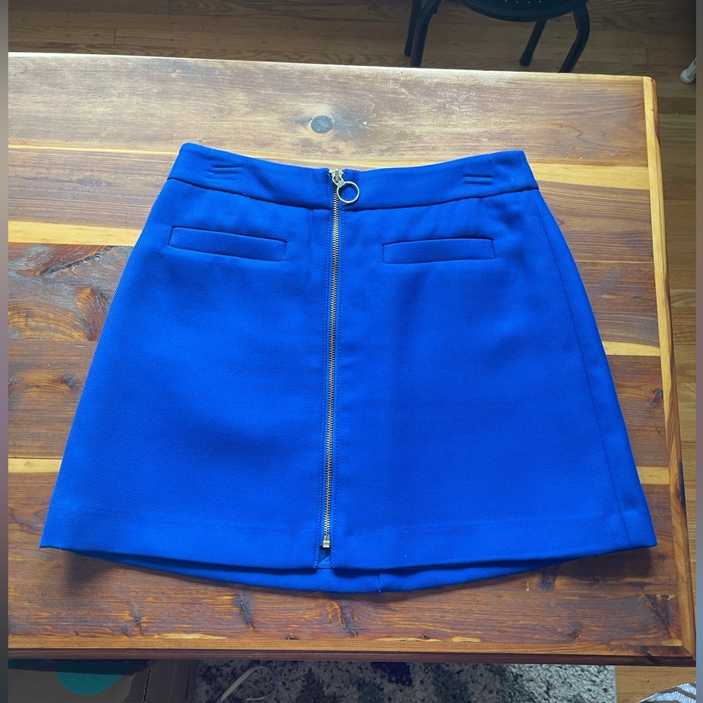 Vibrant blue mini skirt from Express. NWOT size 8.